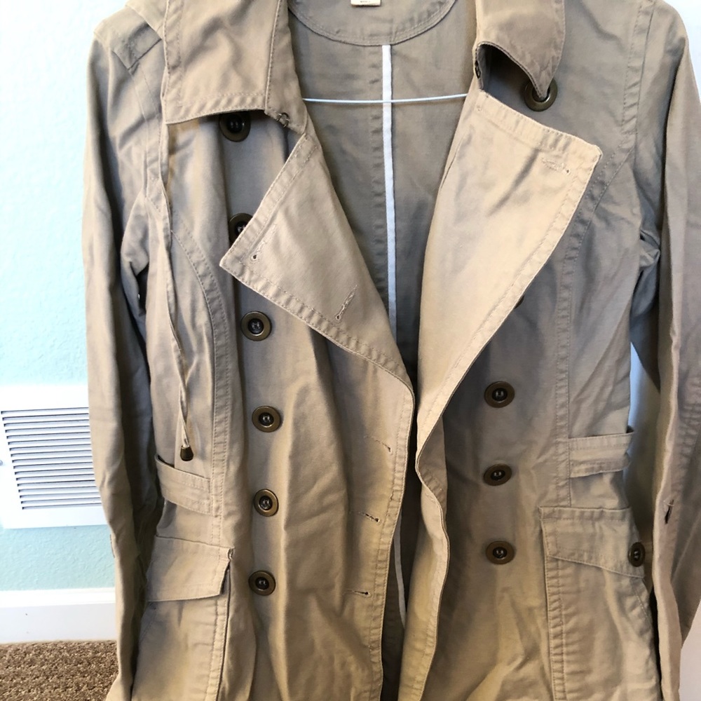Woman’s hooded khaki trench coat
